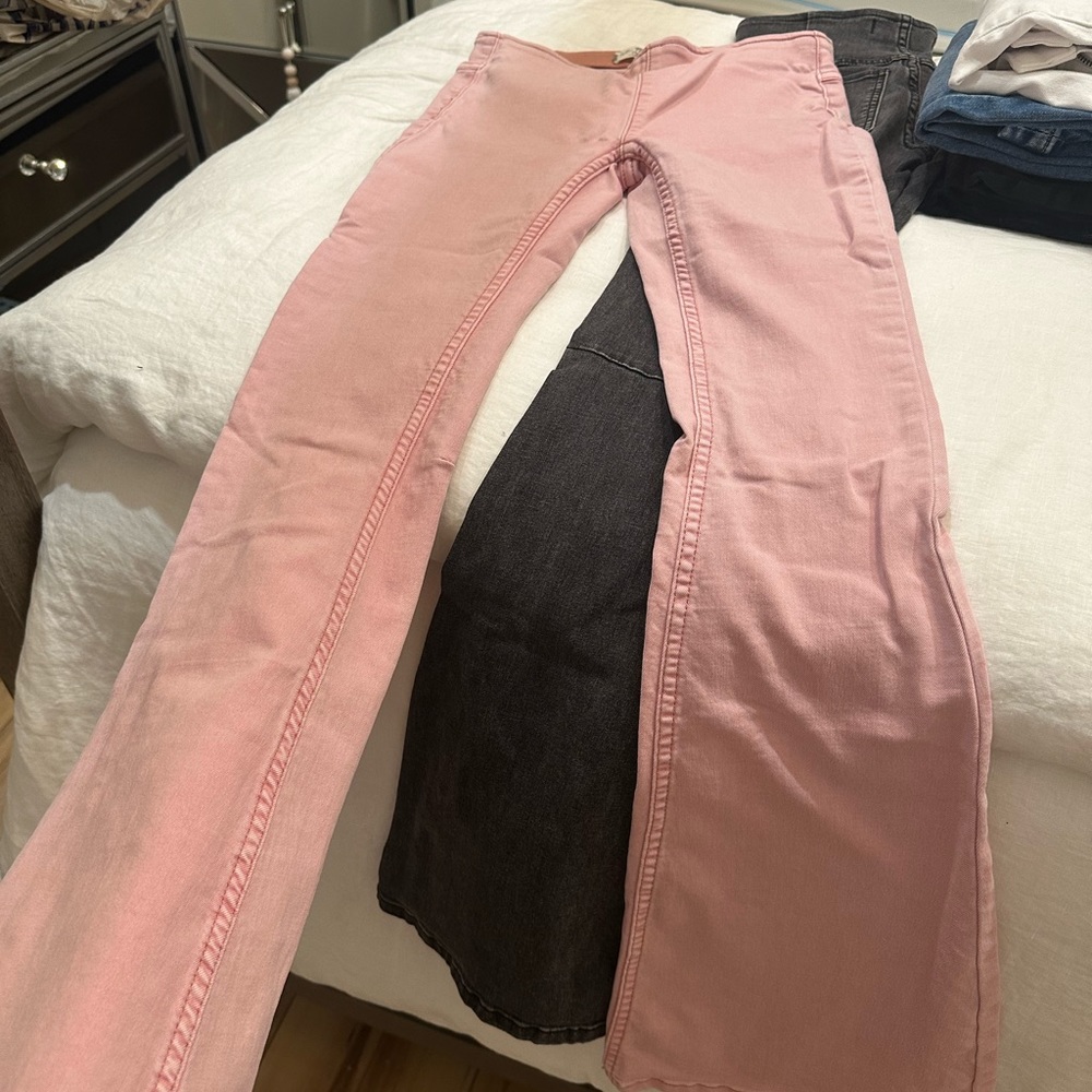 One pair of Free People pull on style flare jeans. Size 24. Color is peachy